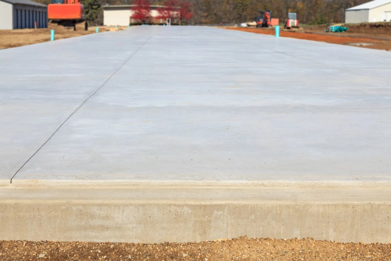 Large finished concrete slab ready for a commercial build